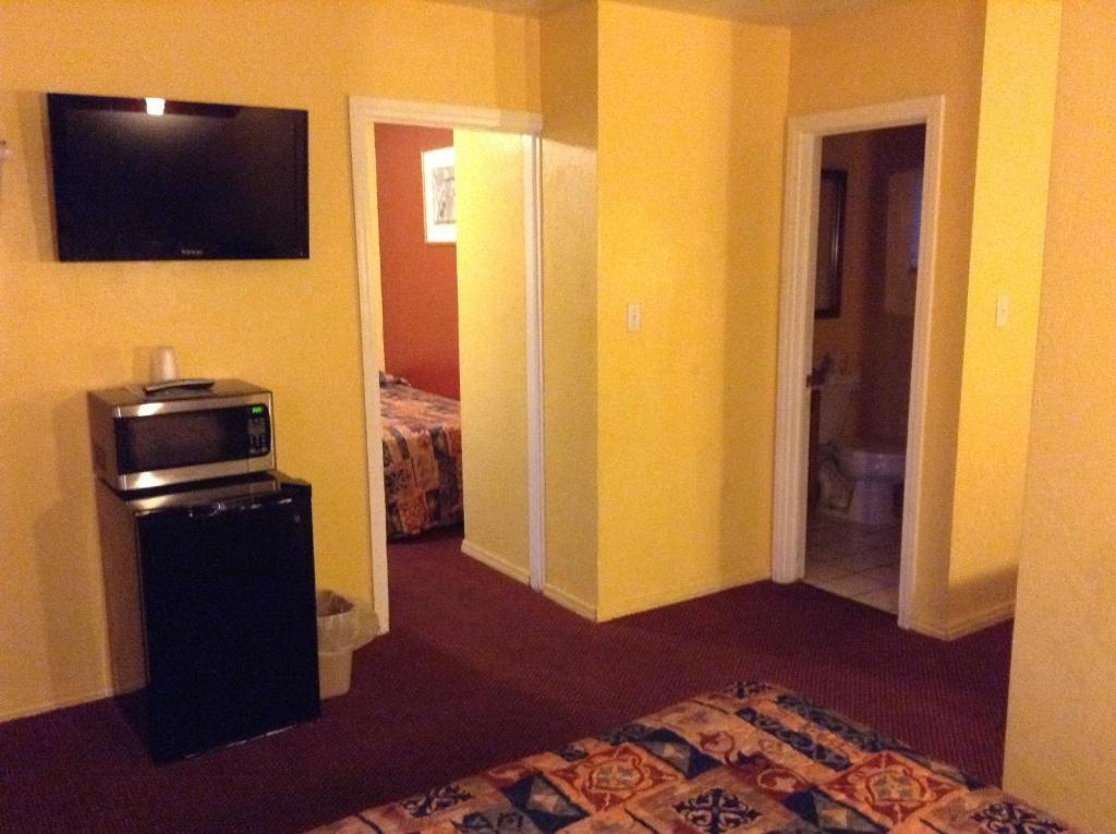 Oceanside Inn & Suites Стая снимка