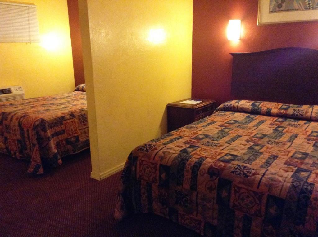 Oceanside Inn & Suites Стая снимка