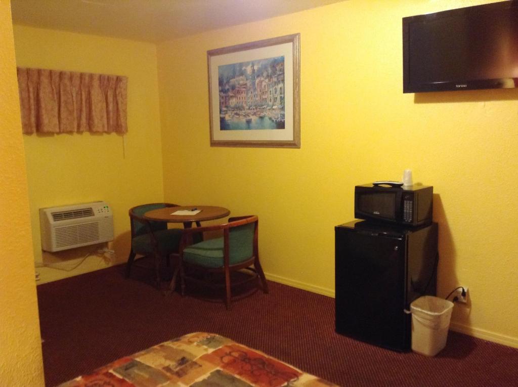 Oceanside Inn & Suites Стая снимка